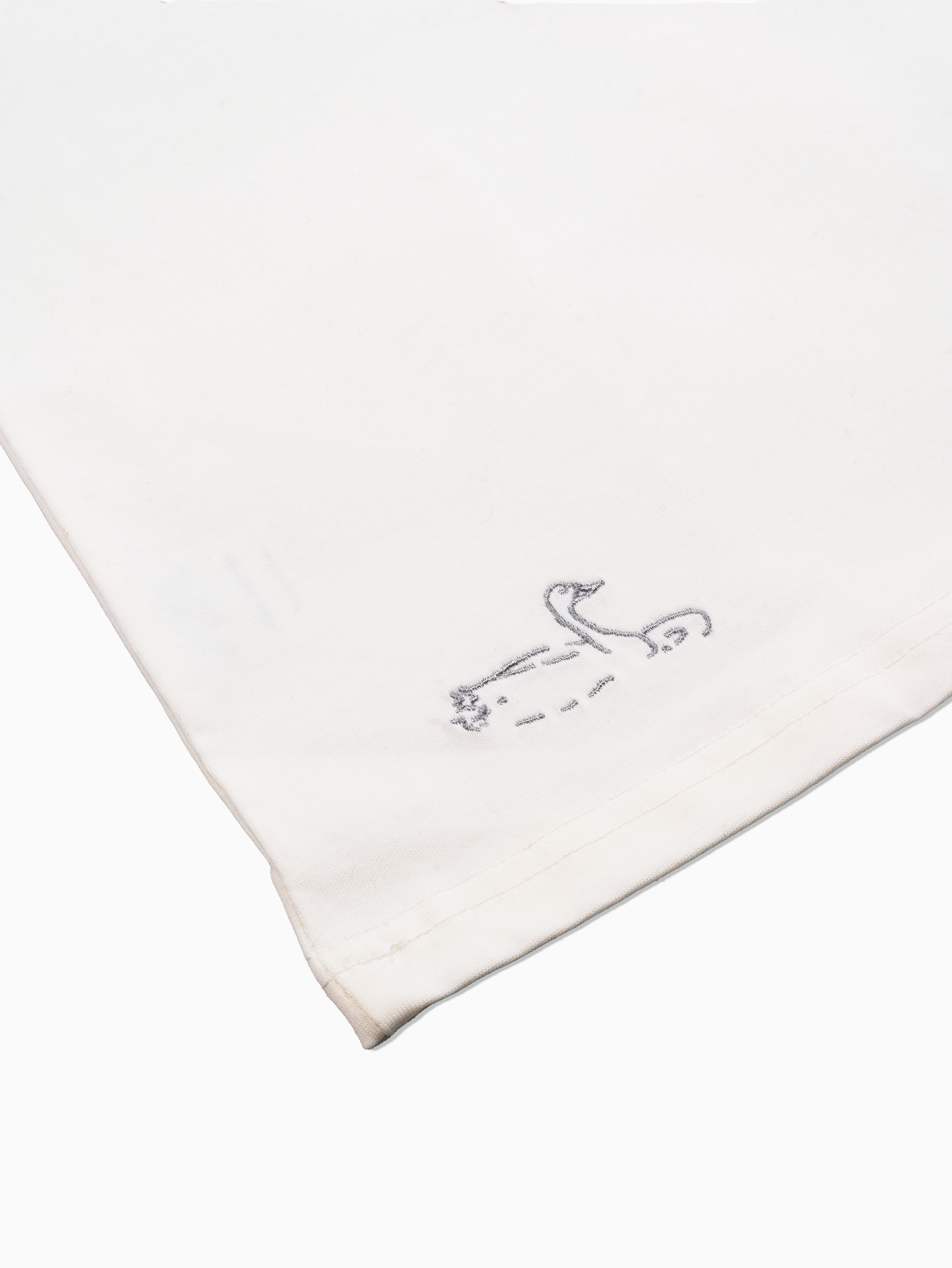 Close up accent view of off white rCeramics swan artwork tee shirt by The Works NY