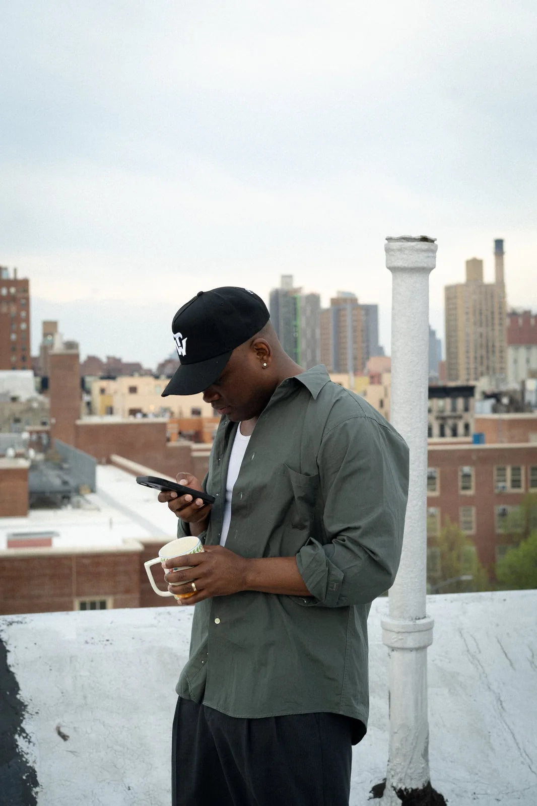Juicy Hat in black — The Works NY, lifestyle view