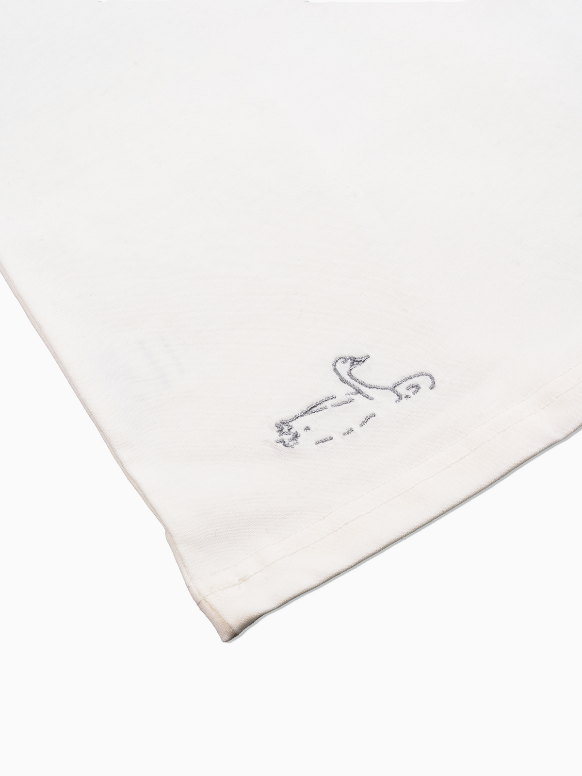 Close up accent view of off white rCeramics swan artwork tee shirt by The Works NY